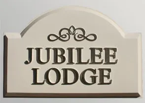 title here Cast arch top house sign