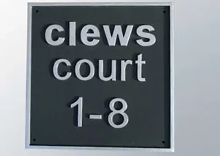 title here Square cast house sign