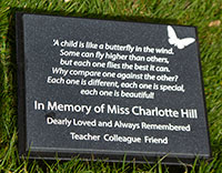 Engraved memorial plaque.