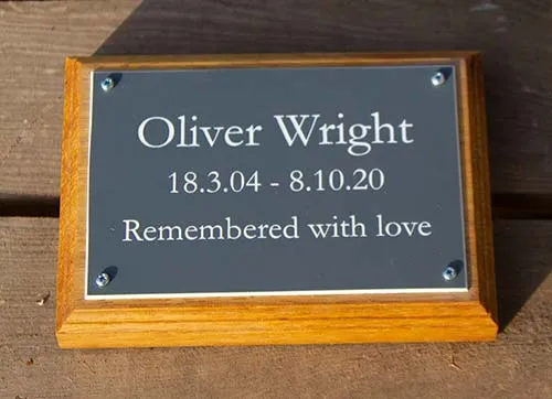 This was fixed to an oak backing board. Grey/ White Memorial Plaque