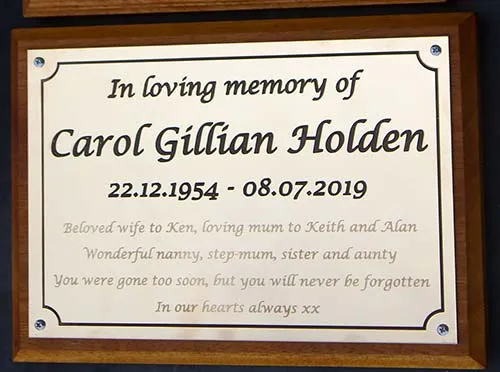 Deep engraved and scratch engraved plaque