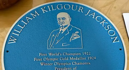 Bronze Memorial with Blue Background