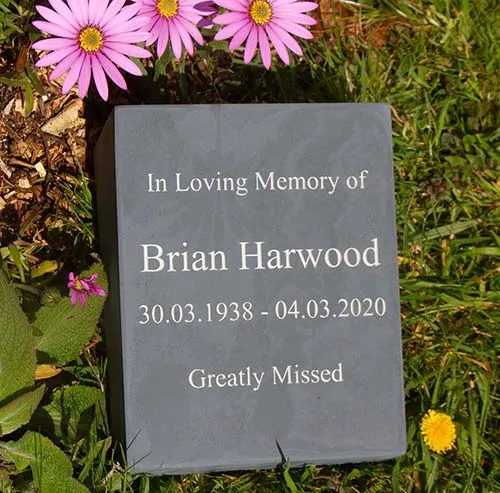 Slate plinth with white engraved text. Slate Memorial Plinth