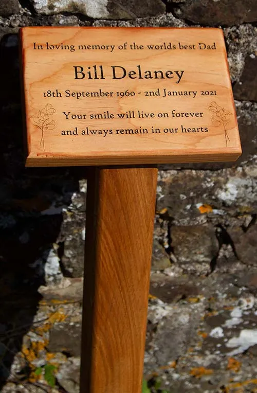 Memorial Plaque on Wooden Post