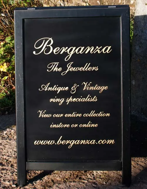 Wooden A-Board pavement sign with black painted Tricoya panel and gold painted lettering – handcrafted by The Sign Maker.