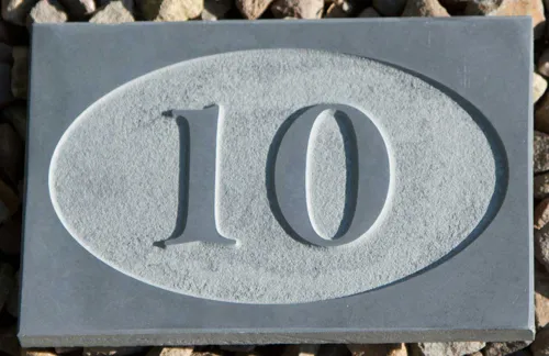 raised slate house number sign