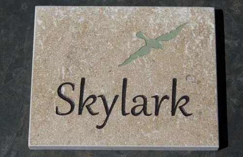 This is a natural stone finish - not honed smooth. Devonshire Cream Tumbled Finish