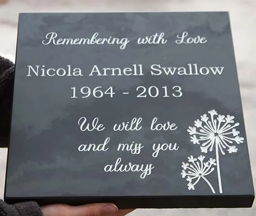 Thick slate memorial tablet.