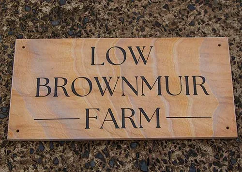 Unusul stone makes for an interesting farm sign. Sandstone  Farm Sign