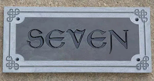 The Lettering is engraved - the border raised and unpainted Raised Slate Border