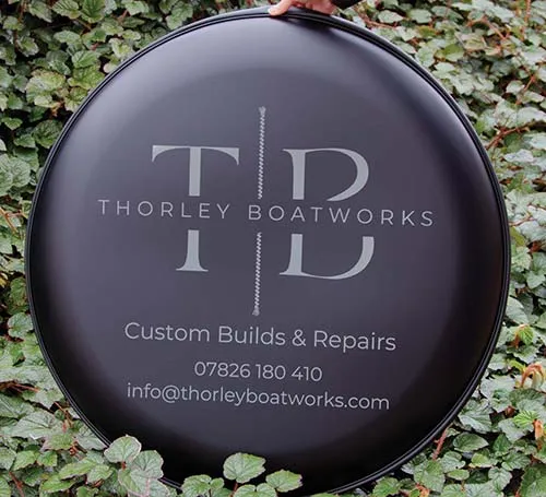 Grey Lettering on Black Wheel Cover