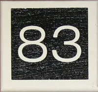 Raised wooden house number