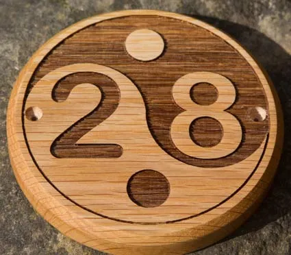 Round wooden house sign