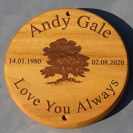 Round wooden memorial plaque