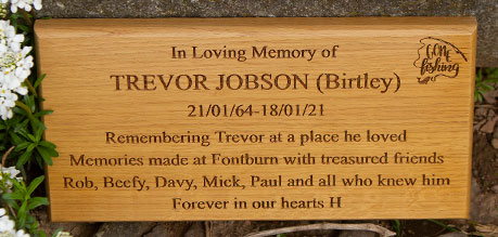 Attractive oak memorial plaque.