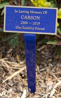Blue bronze plaque on a ground stake