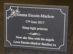 Stone-like corian memorial plaque. Stone-like corian memorial plaque.