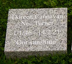 Celtic grey granite wedge with lettering in white - in our opion it shows up better than black text.