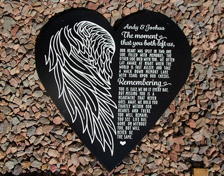 Made to order black corian memorial plaque. Made to order black corian memorial plaque.