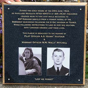 Photo plaque inset into engraved corian plaque.