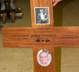 Wooden cross with two photo plaques