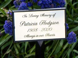 Laser engraved plaque on corian backing board. Laser engraved plaque on corian backing board.