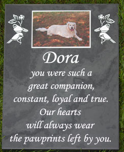 Full colour plaque set into slate memorial.