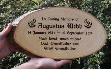 Rustic timber memorial plaque