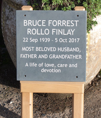 Slate memorial plaque on posts Slate memorial plaque on posts