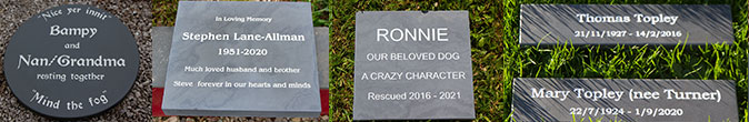 Deep engraved slate memorials and plaques.