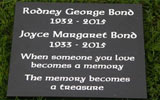 Small black granite memorial tablet.