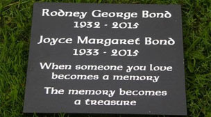 Small black granite memorial tablet.