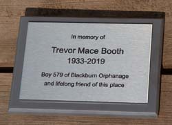 memorial plaque on slate corian backing board. Laser engraved memorial plaque on slate corian backing board.