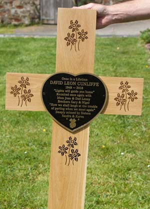 Large oak cross with heart shaped bronze plaque