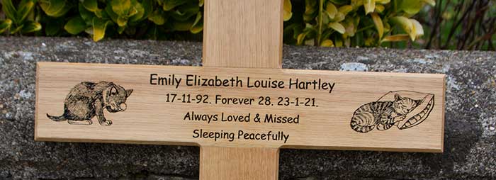 Engraved wooden cross for a cat lover.