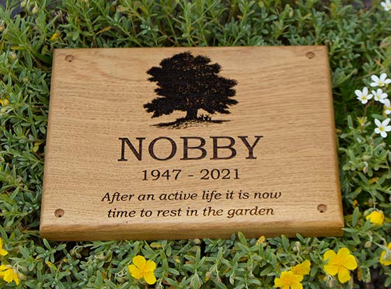 Wooden memorial plaque made from oak.