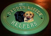 Hand painted cast house sign