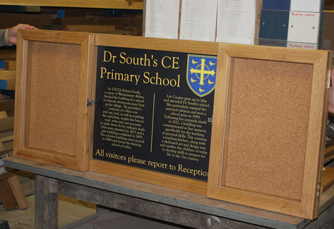 Oak notice board with acrylic doors and weatherproof seals