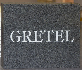 Dark grey granite slab, Font - fantasy,Letter colour -  Lamproom grey