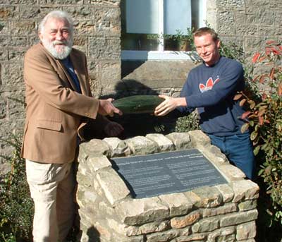 Plaque showing small unpainted letters