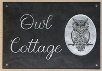 Slate house sign with detailed image. Slate house sign with detailed image.