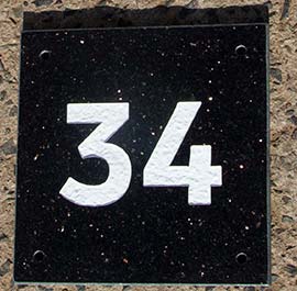 House number sign - black galaxy granite.