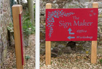 Slate sign inset into oak posts. Slate sign inset into oak posts.