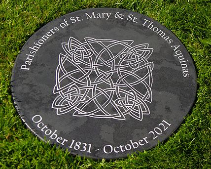 Large round slate sign.