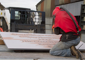 Sand blasting the slate