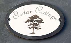 Laser etched slate sign. Laser etched slate sign.