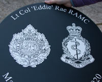 Detailed laser etched crests painted onto slate. Detailed laser etched crests painted onto slate.