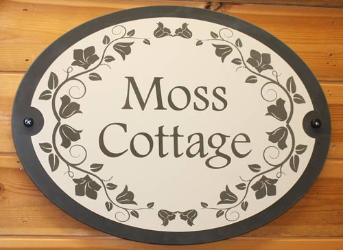 Font - Footlight MT Light - Flowers border - Oval slate sign