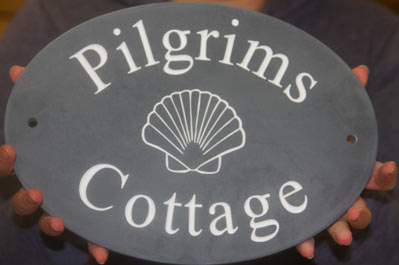 Oval slate house sign