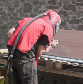 Sand blasting slate